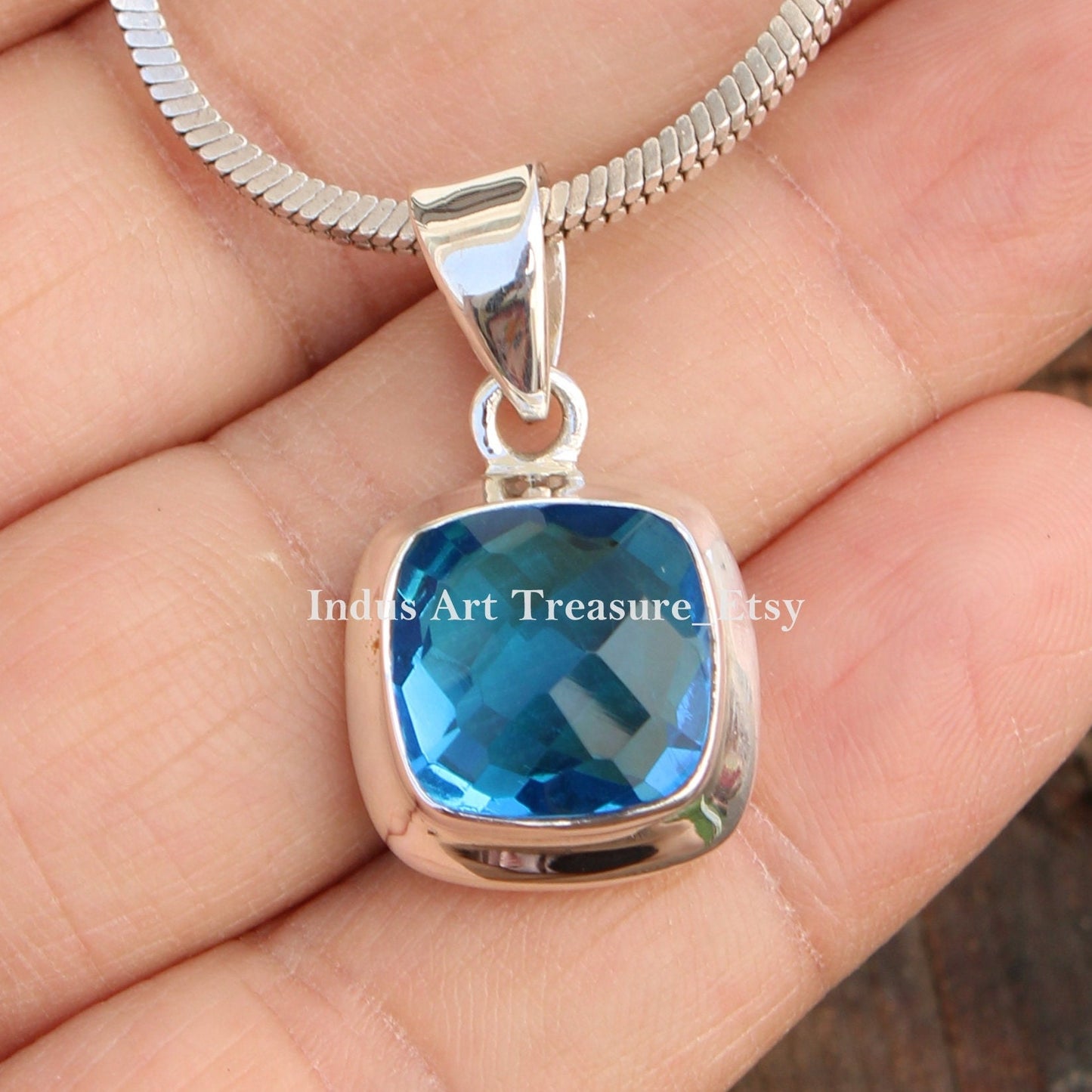Swiss Blue Topaz Pendant